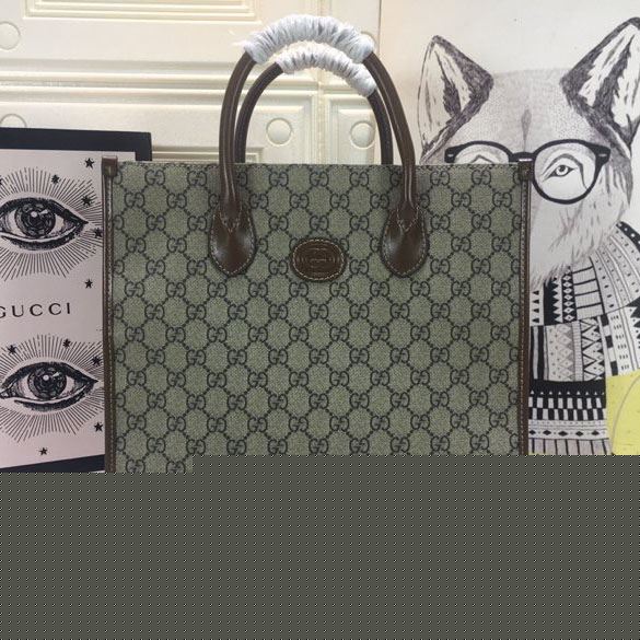 G*u*i shopping bags